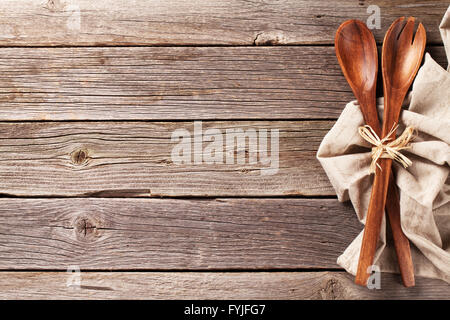 Kitchen utensil over wooden table background. View from above with copy space Stock Photo