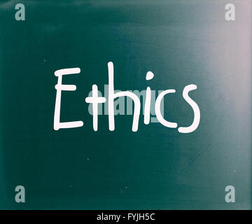 The word Ethics handwritten with white chalk on a blackboard Stock Photo