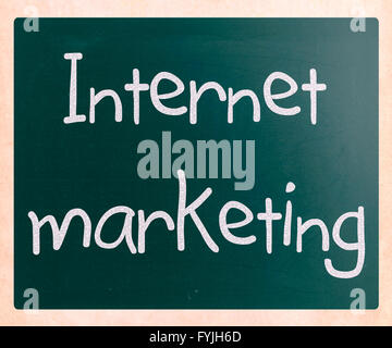 Internet marketing handwritten with white chalk on a blackboard Stock Photo