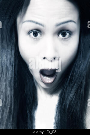 Asian girl being scary Stock Photo