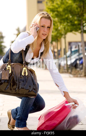 Young woman ducking Stock Photo: 8913709 - Alamy