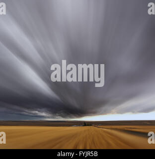A Mirage on high speed. Thunderstorm above fields Stock Photo