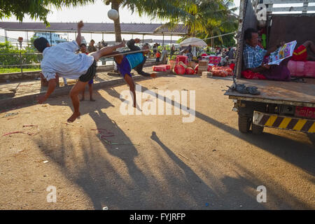 Takraw player at the jetty, Yangon, Myanmar, Asia Stock Photo