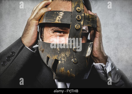 hate, dangerous business man with iron mask and expressions Stock Photo