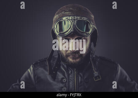 usaf pilot dressed in vintage style leather cap and goggles Stock Photo