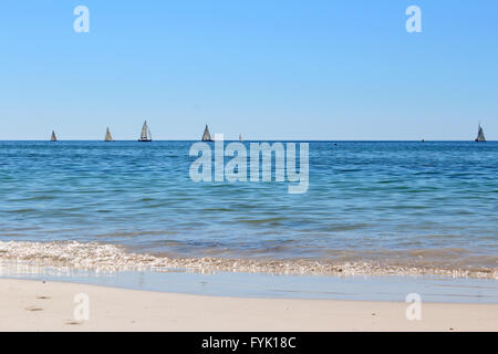 Scenic views near the iconic1.8 kilometre long Busselton jetty Western Australia on a sunny late spring afternoon with the clear calm waters. Stock Photo