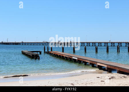 Scenic views near the iconic1.8 kilometre long Busselton jetty Western Australia on a sunny late spring afternoon with the clear calm waters. Stock Photo