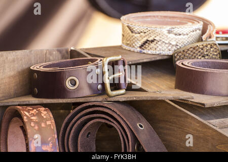 Store handmade  leather belts, spanish medieval fair, couro Stock Photo
