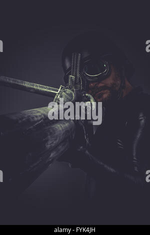 Sniper.soldier with huge space gun. poses in defense and attack Stock Photo