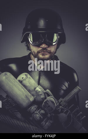 Machine, Future soldier with huge weapon, sci-fi scene Stock Photo