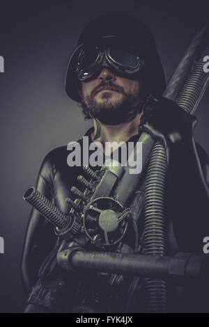 Army, Future soldier with huge weapon, sci-fi scene Stock Photo