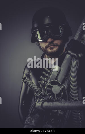 Nuclear army, Future soldier with huge weapon, sci-fi scene Stock Photo