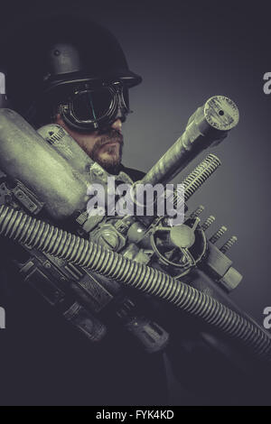 Army fiction, Future soldier with huge weapon, sci-fi scene Stock Photo