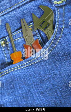 Work tools in Jeans Pocket Stock Photo