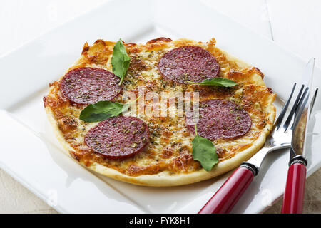 mini salami pizza Stock Photo