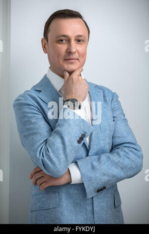 Handsome man in a blue jacket Stock Photo