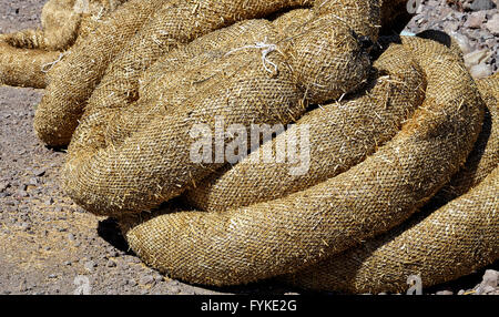 Construction erosion pollution control straw wattles industry closeup Stock Photo