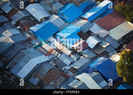 High density corrugated iron houses, Veal, near Siem Reap, Cambodia - aerial Stock Photo