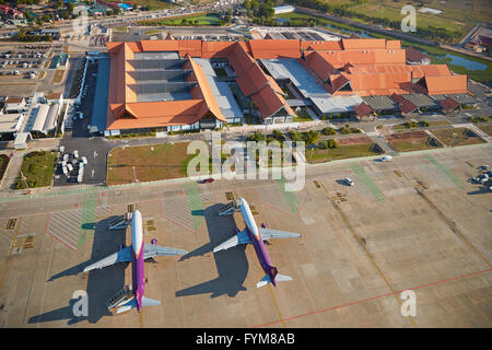 Cambodia Angkor Air planes at Siem Reap International Airport, Siem Reap, Cambodia - aerial Stock Photo
