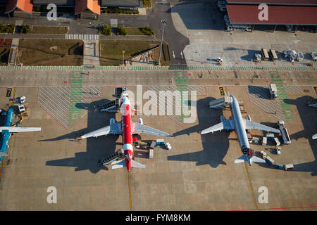 Jets at Siem Reap International Airport, Siem Reap, Cambodia - aerial Stock Photo