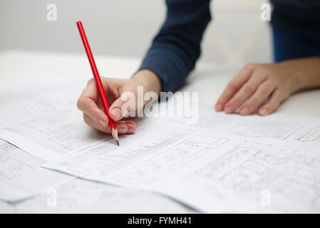 Architect sketching a construction project Stock Photo