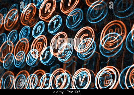Neon typewriter keys close up Stock Photo