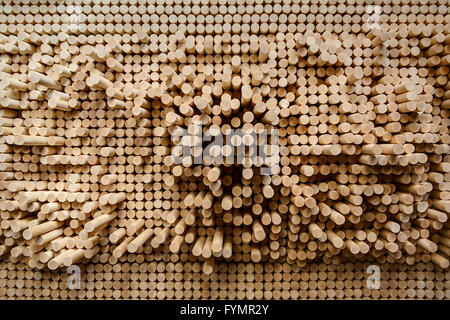 Rows of wooden rounded shanks Stock Photo