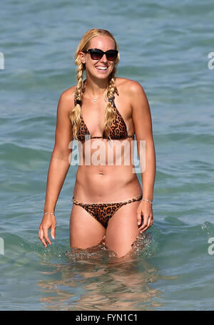 German tennis pro Sabine Lisicki wears a tiny leopard print bikini as she hangs out with Lilly Becker on the beach in Miami on Easter Weekend  Featuring: Sabine Lisicki Where: Miami Beach, Florida, United States When: 26 Mar 2016 Stock Photo