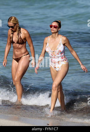 German tennis pro Sabine Lisicki wears a tiny leopard print bikini as she hangs out with Lilly Becker on the beach in Miami on Easter Weekend  Featuring: Lilly Becker, Sabine Lisicki Where: Miami Beach, Florida, United States When: 26 Mar 2016 Stock Photo