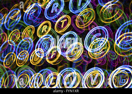 Colorful neon typewriter keys Stock Photo