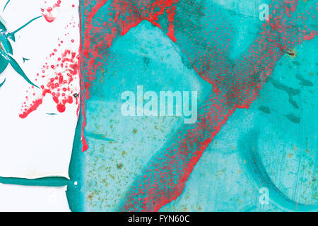Abstract of peeling white paint on a turquoise background with red splatters and rust  marks. Stock Photo