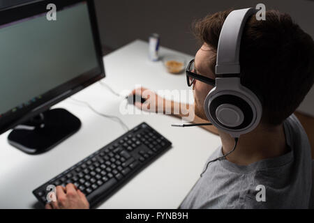close up of man playing computer video game Stock Photo