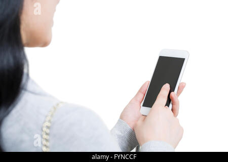 Young woman using smart phone Stock Photo