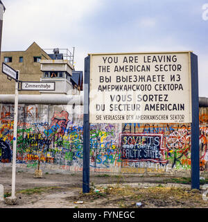 August 1986, leaving American sector warning sign, Berlin Wall graffitis, East Berlin watchtower, Zimmerstrasse street sign, West Berlin, Germany, Europe Stock Photo