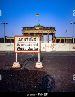 August 1986, leaving West Berlin warning sign in front of the Berlin Wall, Brandenburg Gate in East Berlin, West Berlin side, Germany, Europe, Stock Photo