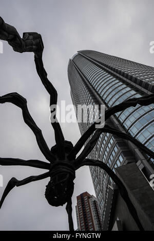 Louise Bourgeois' spider sculpture 'Maman' in front of Mori Tower in Tokyo, Japan Stock Photo