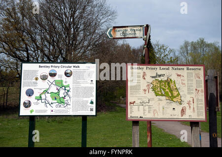 Sign posts with maps of the area in nature reserve Bentley Priory Stock Photo