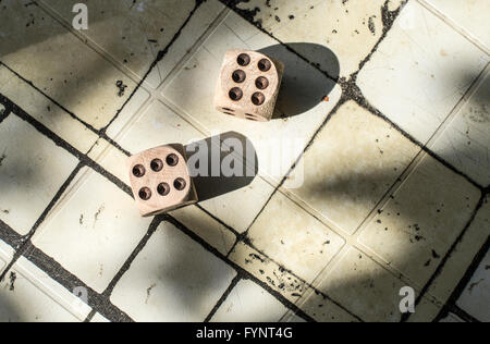 Two wooden dices on table. Stock Photo