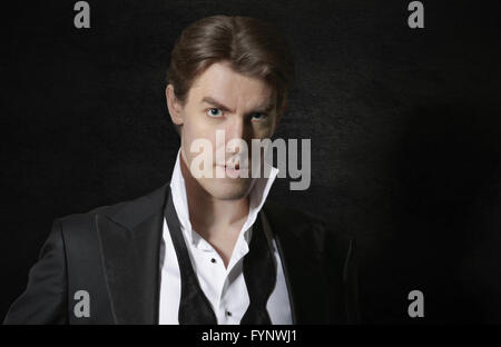 Elegant man in tuxedo Stock Photo