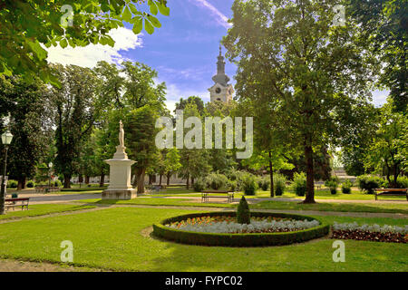 Green park and church in Bjelovar Stock Photo