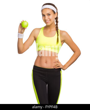 Young sporty woman with apple isolated on white Stock Photo