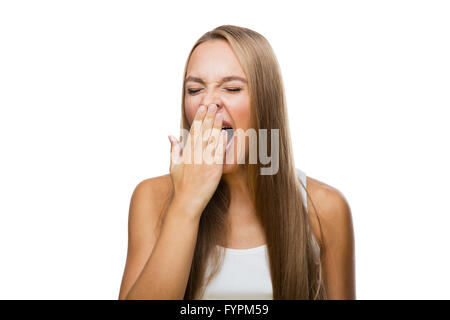 Woman yawns of boredom on white background Stock Photo