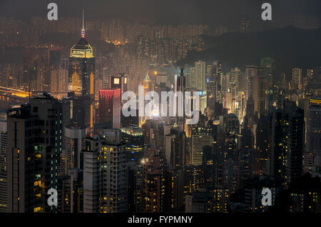 View of skyscrapers at night. The Hong Kong skyline view from the Victoria Peak. Hong Kong, China. Stock Photo