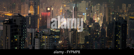 Panoramic view of skyscrapers at night. The Hong Kong skyline view from the Victoria Peak. Hong Kong, China. Stock Photo