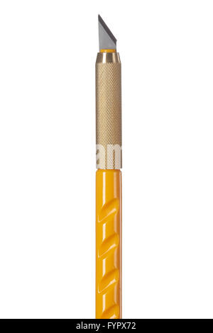a close up vertical shot of a sharp utility knife with a yellow handle. Stock Photo