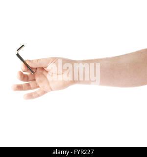 Hand holding a hex metal allen L key tool, composition isolated over the white background Stock Photo