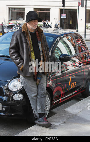 London, UK. 27 April 2016. Pictured: British-Israeli designer Ron Arad poses with his personal Fiat 500, with a 1:1 scale drawing of the 1957 model Cinquecento. The car will be auctioned off. The world's leading designers and artists come together for Time for Design, an auction in aid of the new Design Museum in London. Amongst the star lots are Bono's guitar and a special edition iPad Pro designed by Jony Ive of Apple. The benefit auction will be held at Phillips in London on 28 April 2016. All proceeds will go towards realising the Design Museum's ambition of creating the world's leading mu Stock Photo