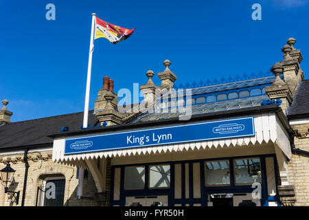 The Norfolk flag flying over refurbished King's Lynn railway station featuring British Railways branding. Stock Photo