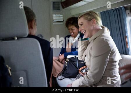 U.S President Barack Obama talks with Deputy Chief of Staff Anita Decker Breckenridge aboard Marine One after she had met Queen Elizabeth at Windsor Castle April 22, 2016 in Windsor, United Kingdom. Stock Photo