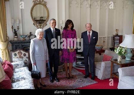 Queen Elizabeth II and Prince Philip, Duke of Edinburgh, pose for a photo with U.S President Barack Obama and First Lady Michelle Obama before lunch at Windsor Castle April 22, 2016 in Windsor, United Kingdom. Stock Photo